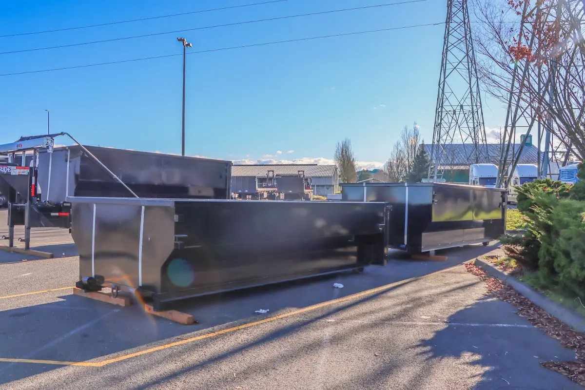 Roll-off dumpster ready for waste disposal at job site for 2 Yard Dumpster Rental in Sandston